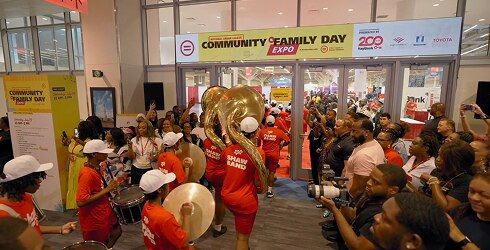 Marching band walking through expo doors