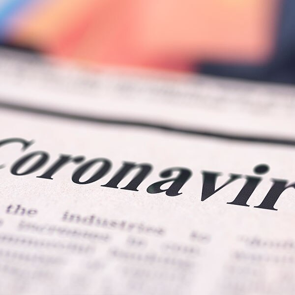 The word "coronavirus" within a newspaper headline