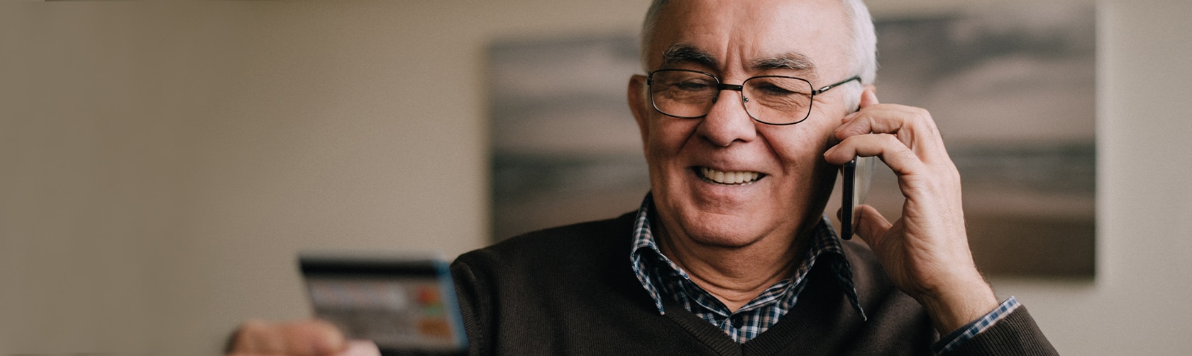 man on phone to activate card