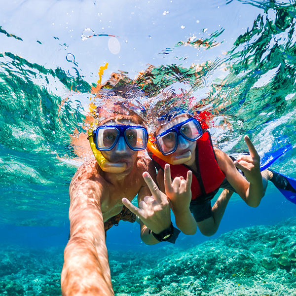 father and son snorkeling