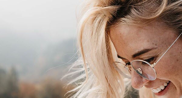 Smiling woman with glasses