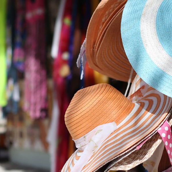 hats hanging in store