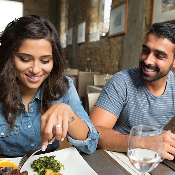 Young couple eating at a restaurant