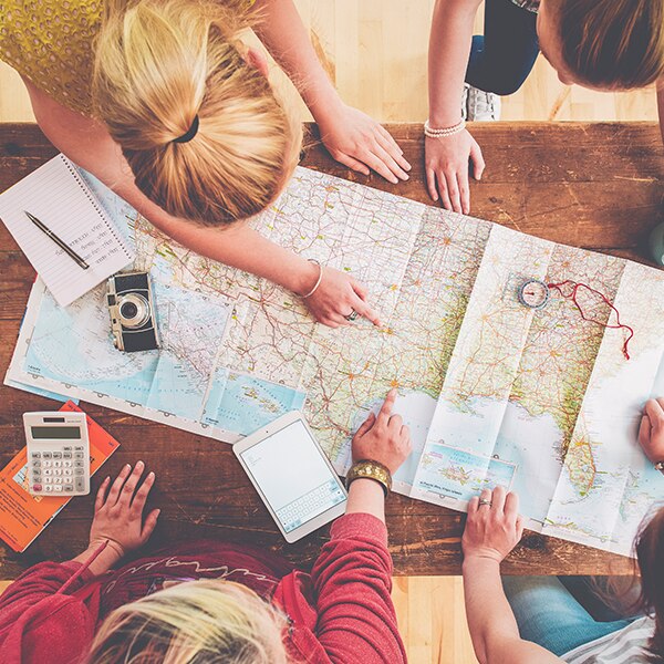 Family looking at map