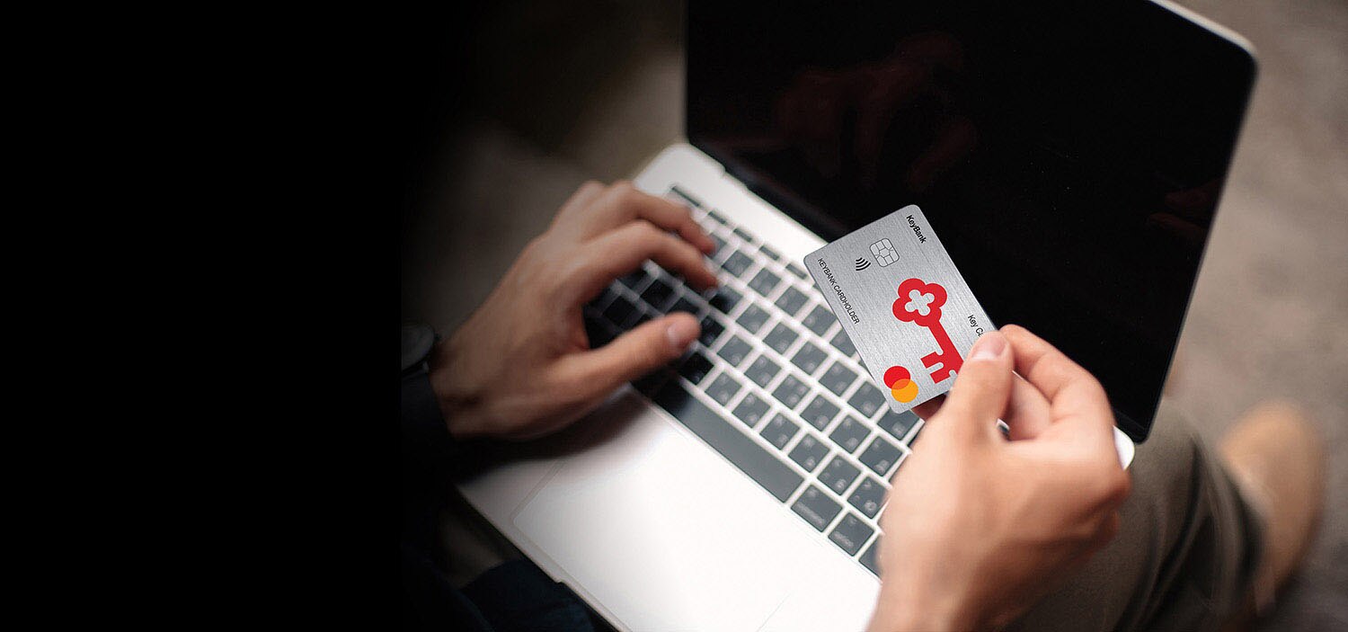person holding a credit card