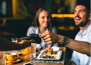 Man Paying Bill with Mastercard
